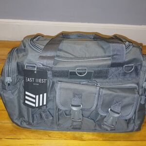 Gray Duffel Bag with Multiple Compartments and Adjustable Straps